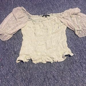 green puff sleeved shirt